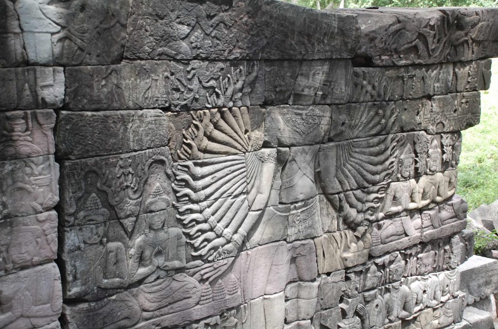 Image: Bas-relief of a multi-armed Avalokiteshvara on the west side of the temple complex at Banteay Chhmar: Banteay Chhmar Community-Based Tourism